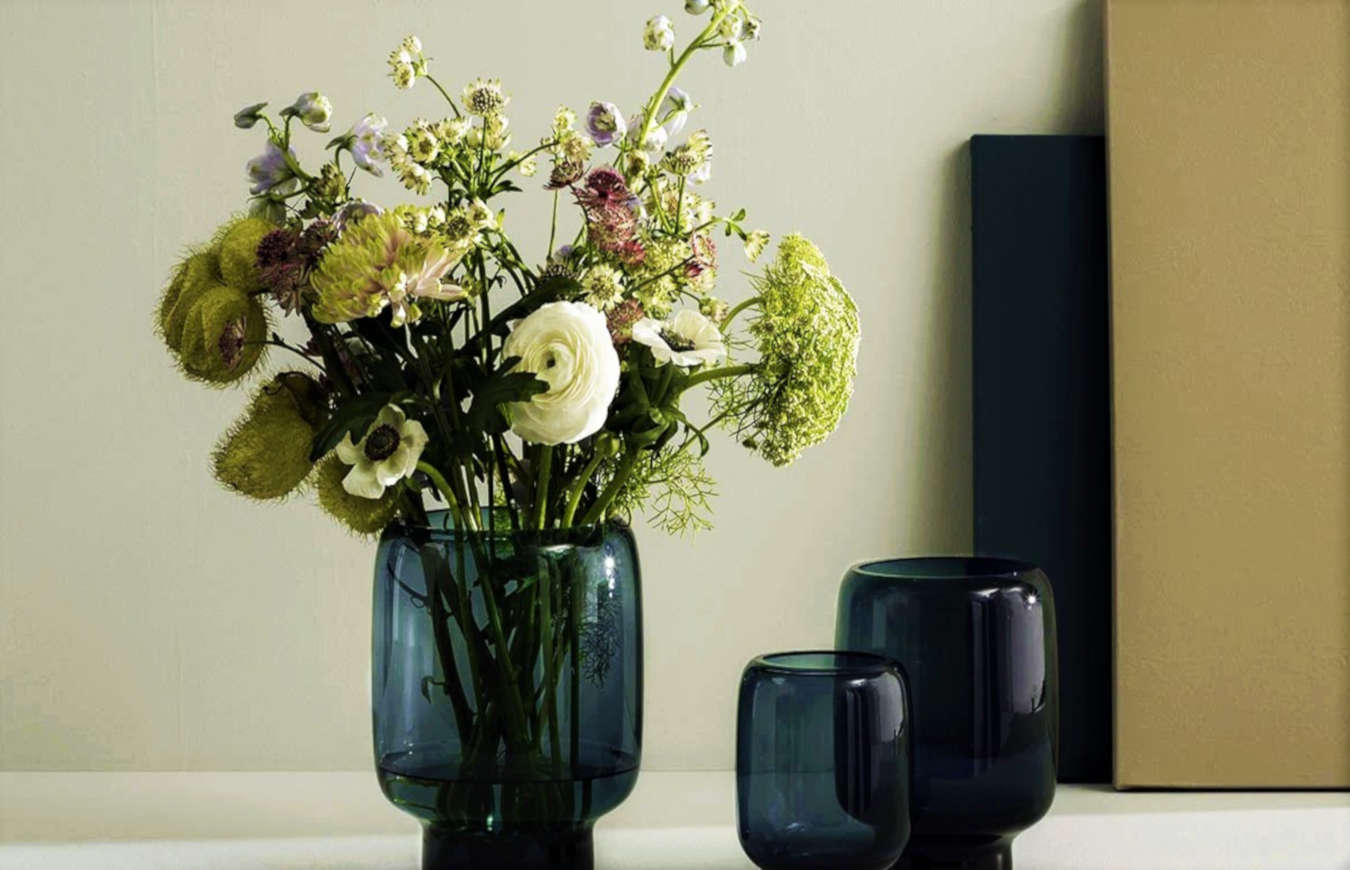 Artificial flowers and plants in a living room decor.