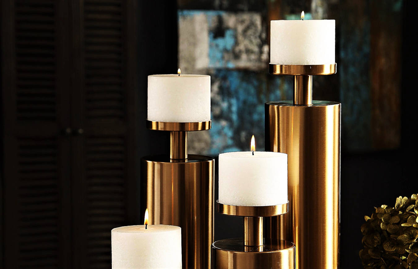 Luxury golden candle holder in a living room.
