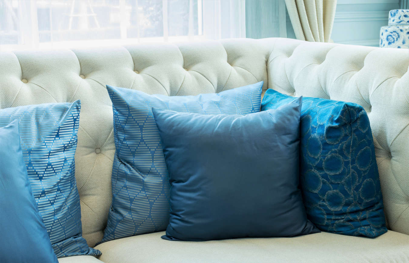 Luxury rugs and cushions in a living room decor.